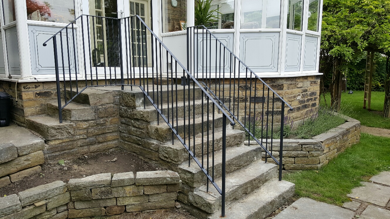 Wrought iron handrails in anthracite grey - resin fixed