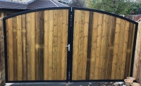 Arched Top Metal Driveway Gate With Wood Infill