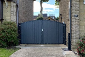 Arched Top Metal Estate Gate With Composite Infill[1]